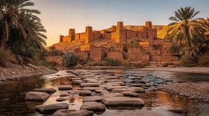 Aït Ben Haddou at golden hour — the ancient ksar in southern Morocco that stands at the crossroads of Saharan, Amazigh and Islamic architectural traditions